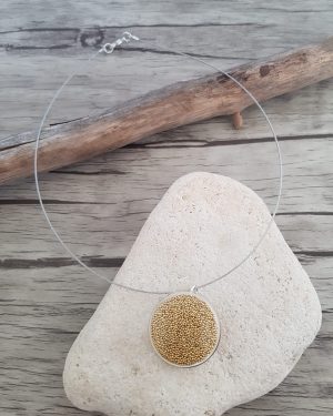 Collier bulle de verre et micro-billes dorées