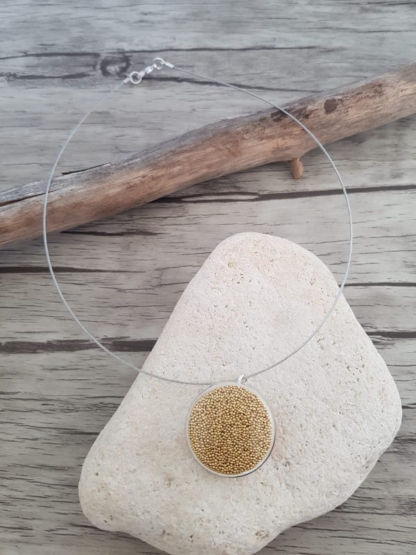 Collier bulle de verre et micro-billes dorées