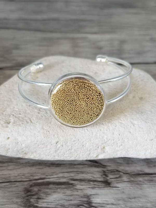Bracelet capsule de verre et micro-billes doré